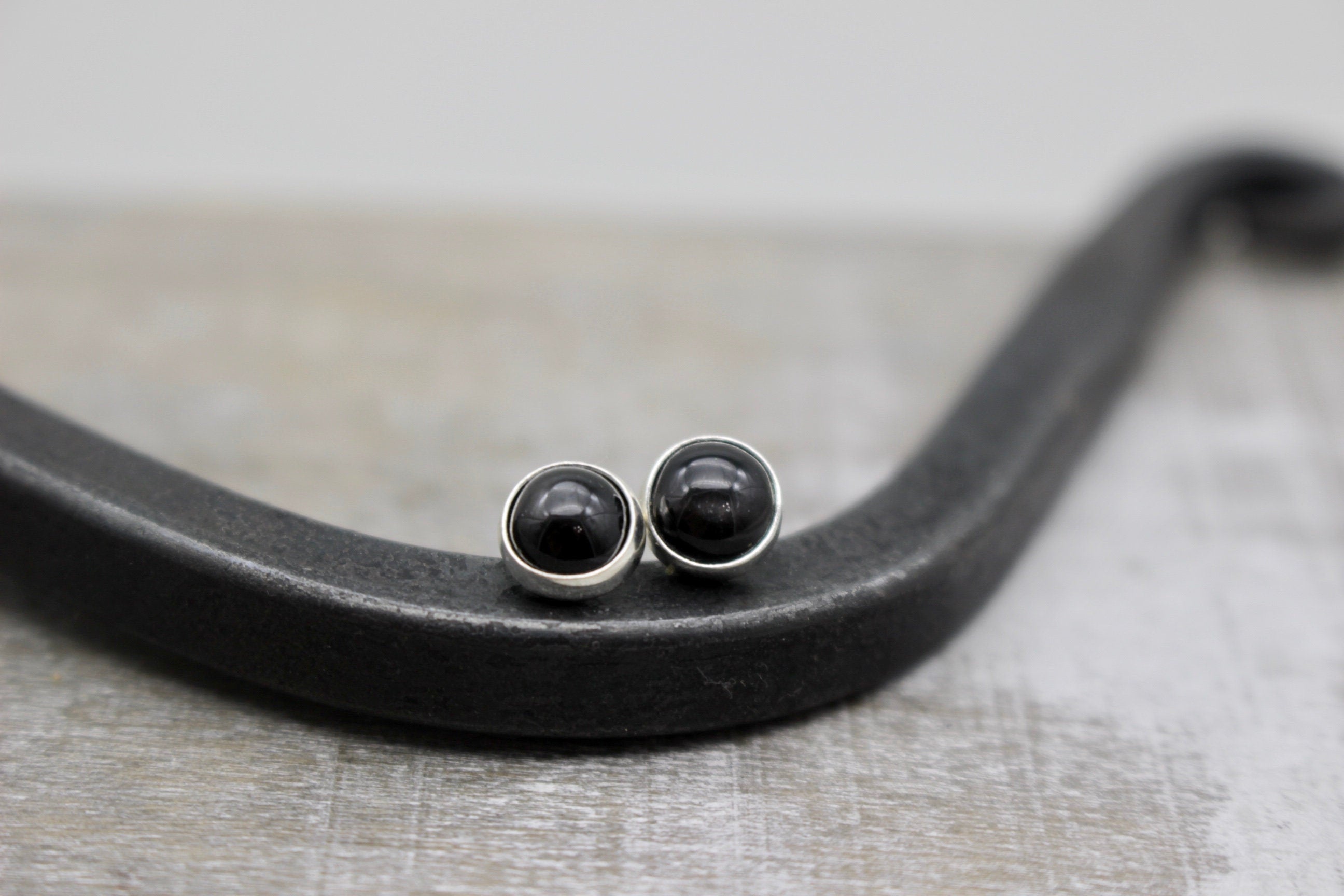 Black star post earrings