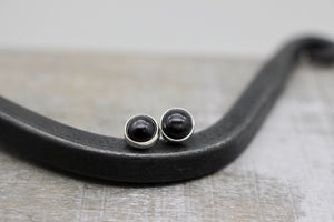 Black star post earrings