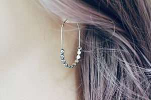 Floral sterling silver hoop earring