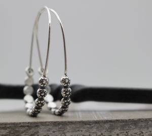 Floral sterling silver hoop earring