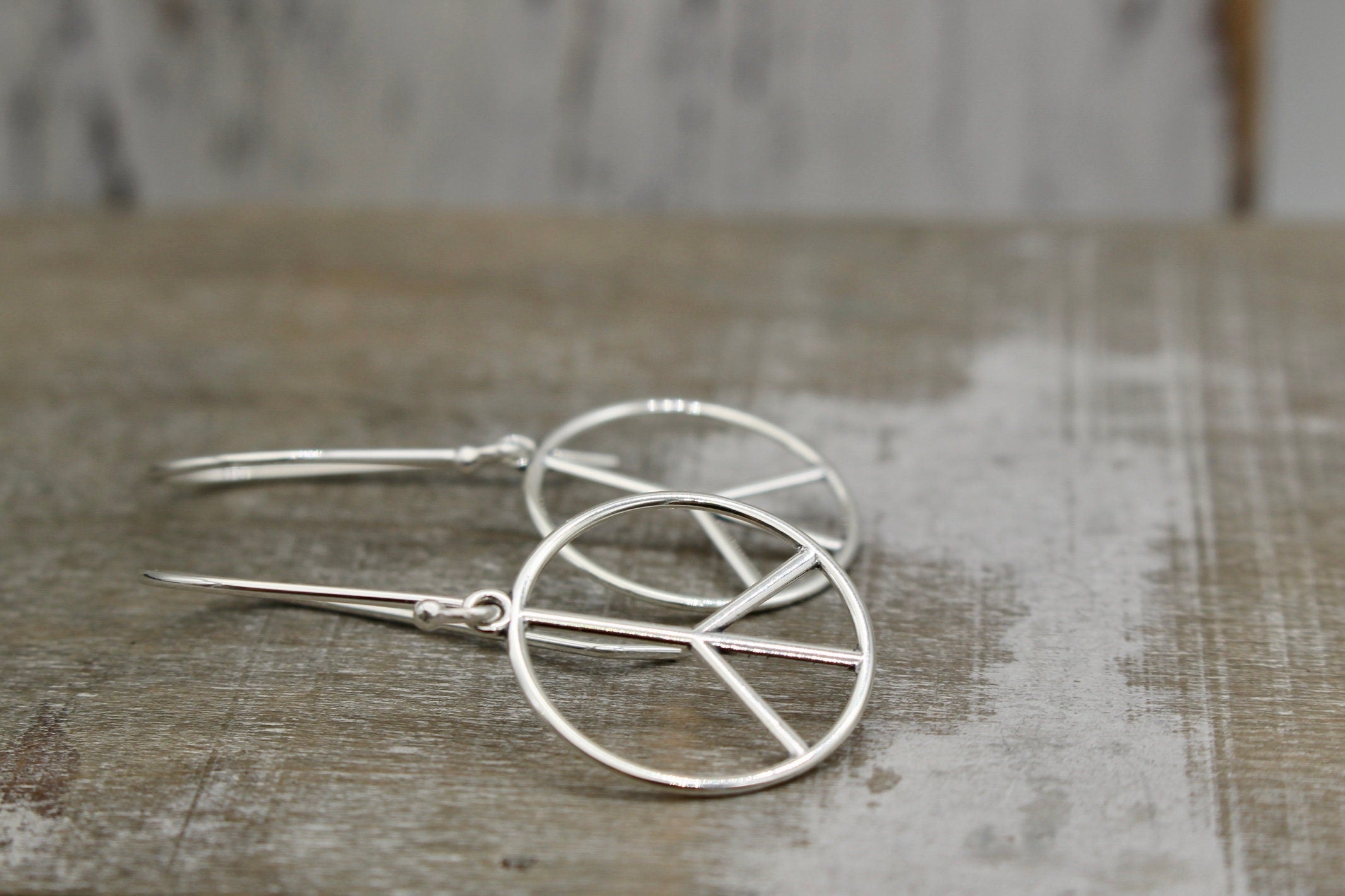 Sterling silver peace earrings
