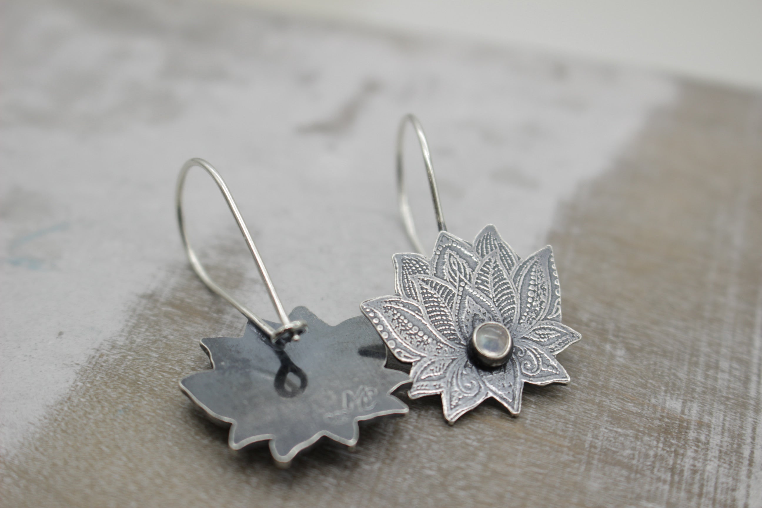 Sterling silver lotus hoops